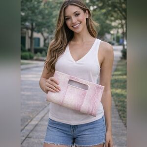Charming Charlie pink snakeskin clutch